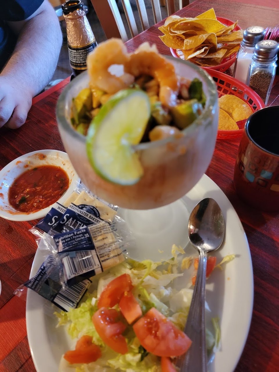 Printed menu showing Mexican dishes and kids' options.